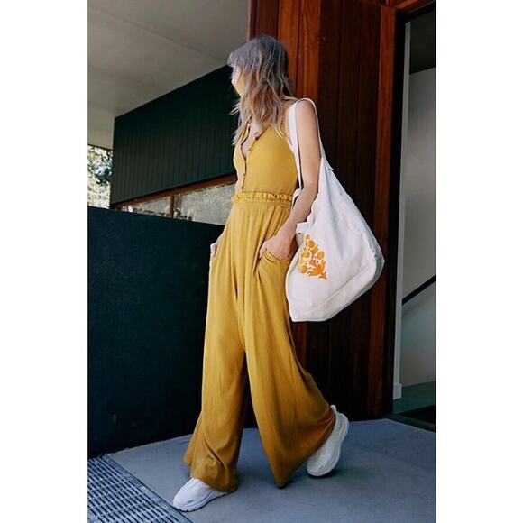 Free People Pants - Free People Movement Caught My Tempo Jumpsuit Open back wide leg Medium